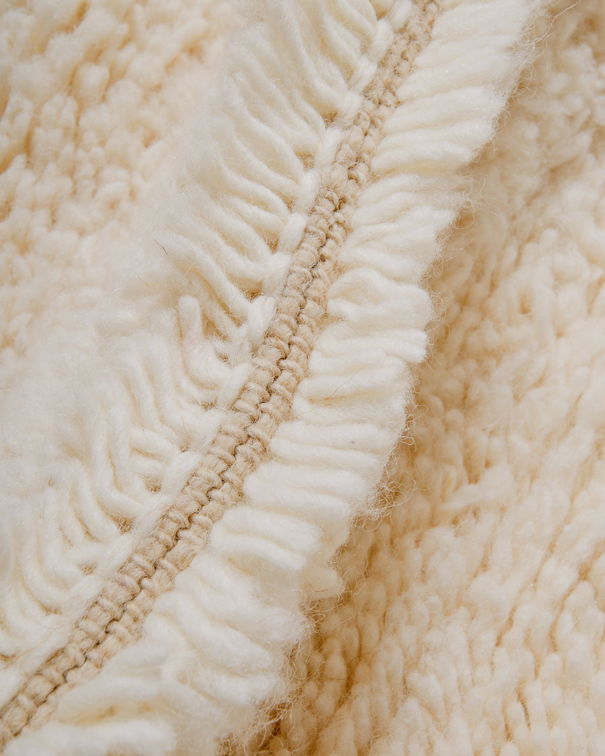 Detail of wool texture of Berberlin beniourain rug.